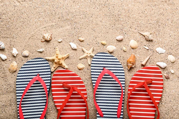 Striped Flip Flops Seashells Starfishes Sand — Stock Photo, Image