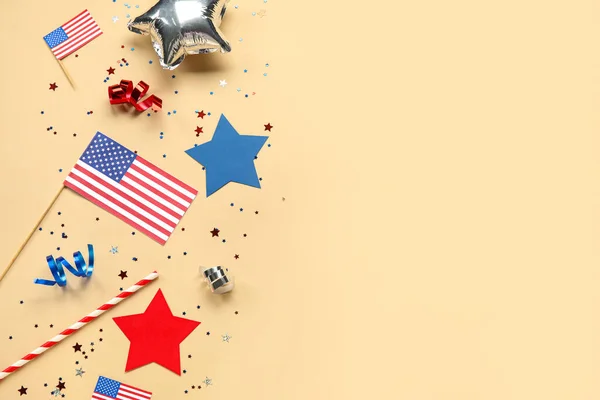 USA flags with stars and serpentine on beige background. Independence Day celebration