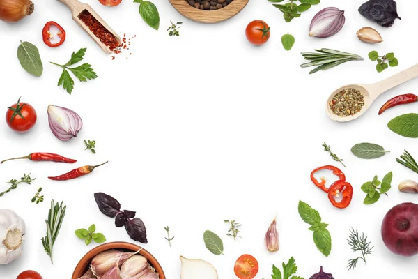 Frame made of different spices, herbs and vegetables on white background