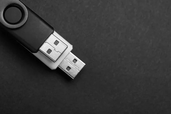 USB flash drives on dark background