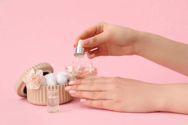 Female Hands Bottle Cuticle Oil Cotton Balls Carnation Flowers Pink — Stock Photo, Image