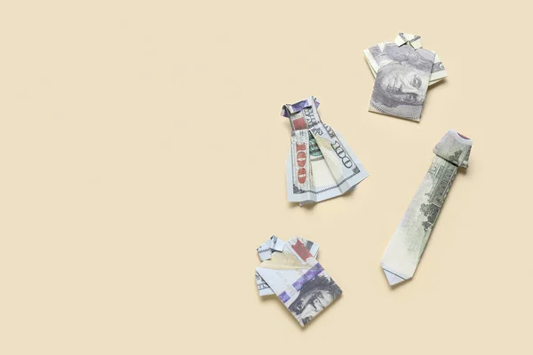 Origami Ubrania Wykonane Banknotów Dolarowych Beżowym Tle — Zdjęcie stockowe