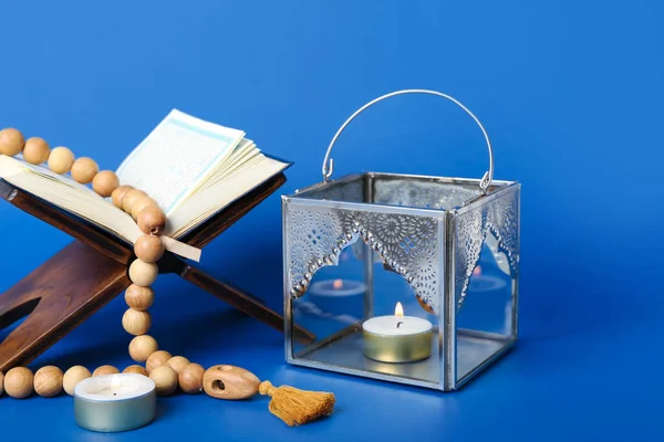 Muslim Lamp Burning Candles Prayer Beads Koran Blue Background — Stock Photo, Image