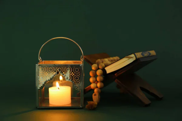 Muslim Lamp Burning Candle Koran Prayer Beads Dark Green Background — Stock Photo, Image