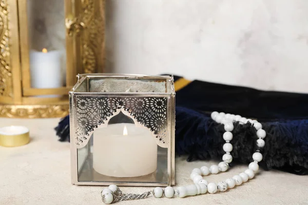 Muslim Lamp Burning Candle Prayer Beads Mat White Table Closeup — Stock Photo, Image