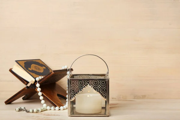 Muslim Lamp Burning Candle Koran Prayer Beads Light Wooden Background — Stock Photo, Image