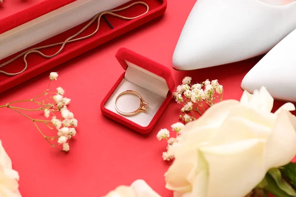 Boxes Engagement Ring Necklace Heels Flowers Red Background Closeup — Stock Photo, Image