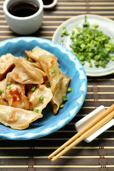 Plate Tasty Chinese Jiaozi Onion Sauce Table — Stock Photo, Image