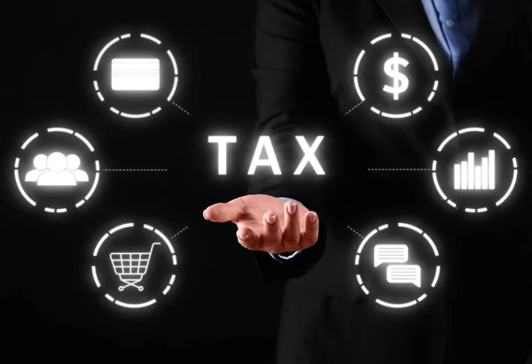 Businesswoman Using Virtual Screen Word Tax Dark Background — Stock Photo, Image