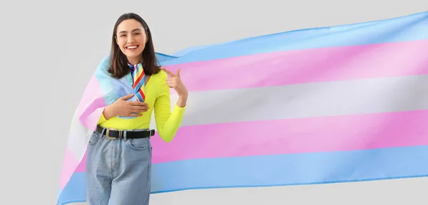 Young Woman Transgender Flag Light Background — Stock Photo, Image