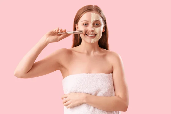 Young Woman Applied Turmeric Mask Brush Pink Background — Stock Photo, Image