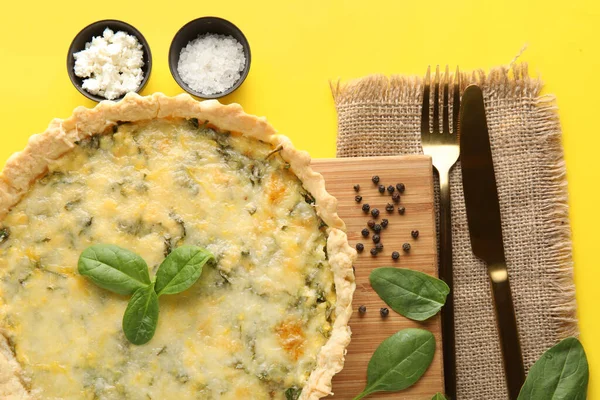 Board Delicious Quiche Spinach Leaves Cutlery Yellow Background — Stock Photo, Image