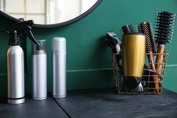 Different Hair Sprays Accessories Table Green Wall — Stock Photo, Image