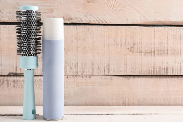 Bottle Hair Spray Brush Light Wooden Background — Stock Photo, Image