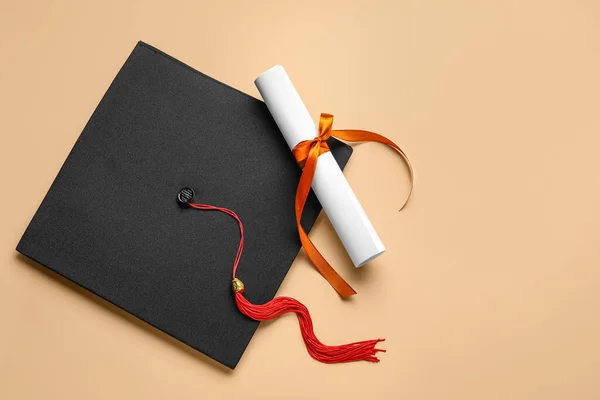 Diploma Red Ribbon Graduation Hat Beige Background — Stock Photo, Image