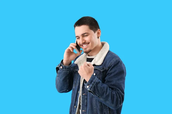 Happy Young Man Talking Smartphone Light Blue Background — Stock Photo, Image