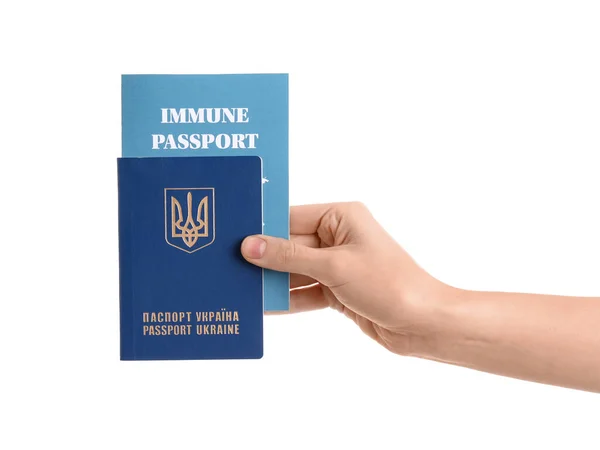 持乌克兰护照和白色背景豁免护照的妇女 — 图库照片