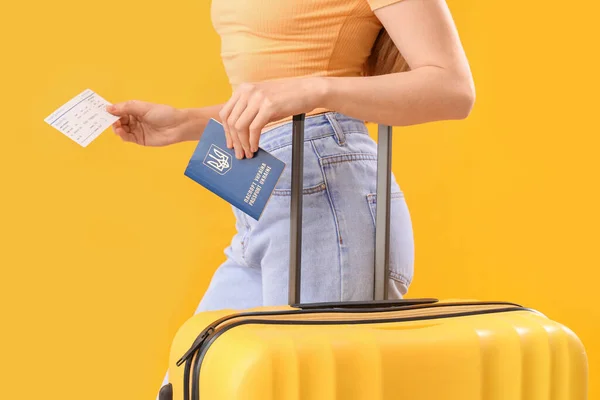 Woman Ukrainian Passport Ticket Suitcase Yellow Background Closeup — Stock Photo, Image