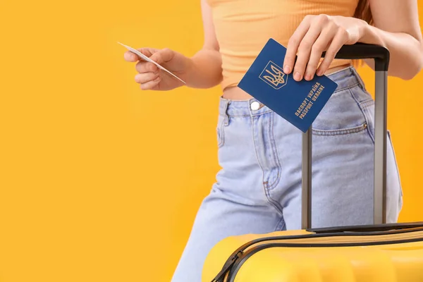 Woman Ukrainian Passport Ticket Suitcase Yellow Background Closeup — Stock Photo, Image