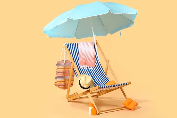 Deck Chair Blue Umbrella Beach Accessories Beige Background — Stock Photo, Image