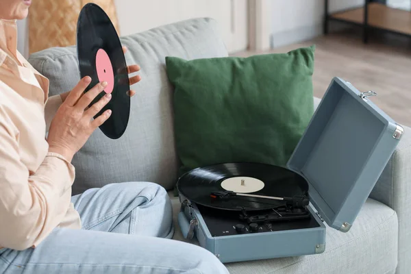 Mature Woman Vinyl Disk Record Player Sitting Sofa Home — Stock Photo, Image