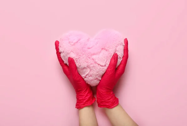 Woman Rubber Gloves Heart Pillow Pink Background — Stock Photo, Image