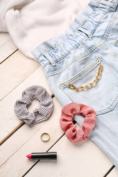 Silk Scrunchies Jewelry Lipstick Jeans White Wooden Background Closeup — Stock Photo, Image