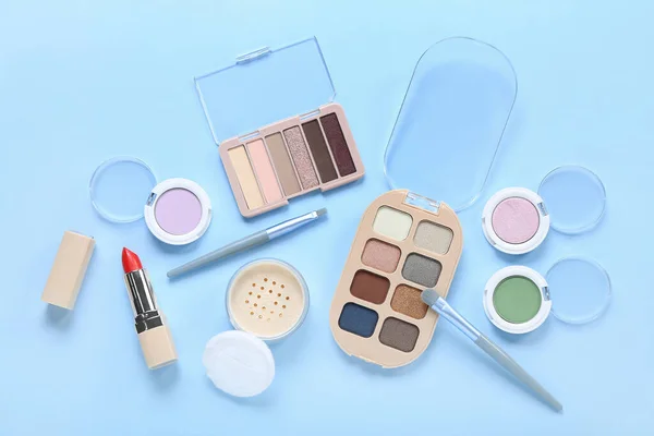 Eyeshadows Brushes Powder Lipstick Blue Background — Stock Photo, Image
