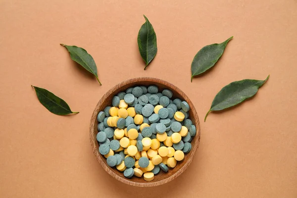 Bowl Pills Plant Leaves Beige Background — Stock Photo, Image