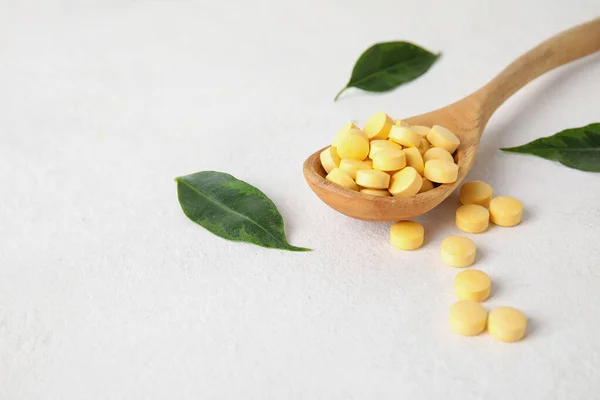 Spoon Pills Leaves White Table Closeup — Stock Photo, Image
