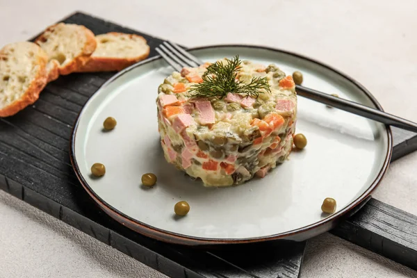Plate Tasty Olivier Salad Light Background — Stock Photo, Image