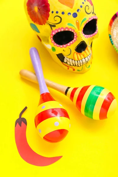 Mexican Maracas Paper Chili Pepper Painted Skull Yellow Background Closeup — Stock Photo, Image