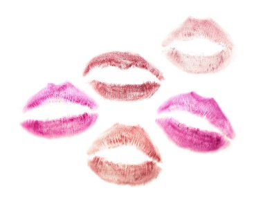 Lipstick kiss marks on white background