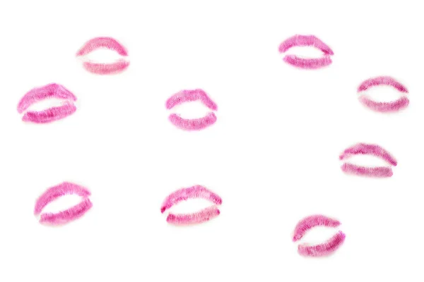 粉红唇膏在白底上的吻印 — 图库照片