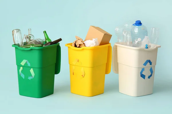 Containers Different Types Garbage Light Blue Background Recycling Concept — Stock Photo, Image