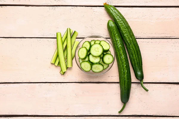 Bowl Cut Whole Cucumbers Light Wooden Background — Stock Photo, Image