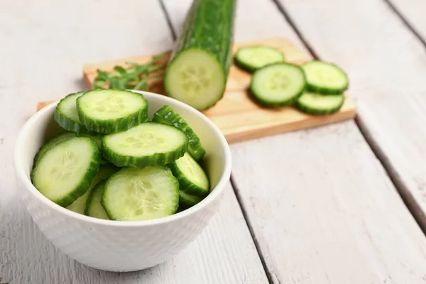 Bowl Fresh Cut Cucumber Light Wooden Background — Stock Photo, Image
