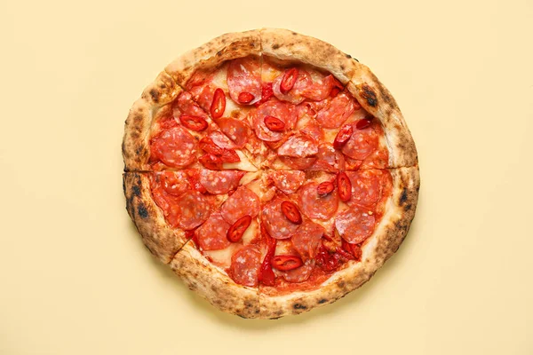 stock image Delicious pepperoni pizza on beige background