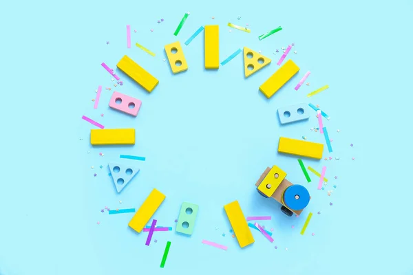 Cadre Jouets Pour Bébés Confettis Sur Fond Bleu Célébration Journée — Photo