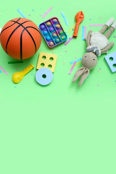 Baby Toys Confetti Green Background Children Day Celebration — Stock Photo, Image
