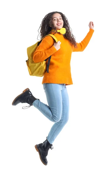 Female Student Headphones Backpack Jumping White Background — Stock Photo, Image