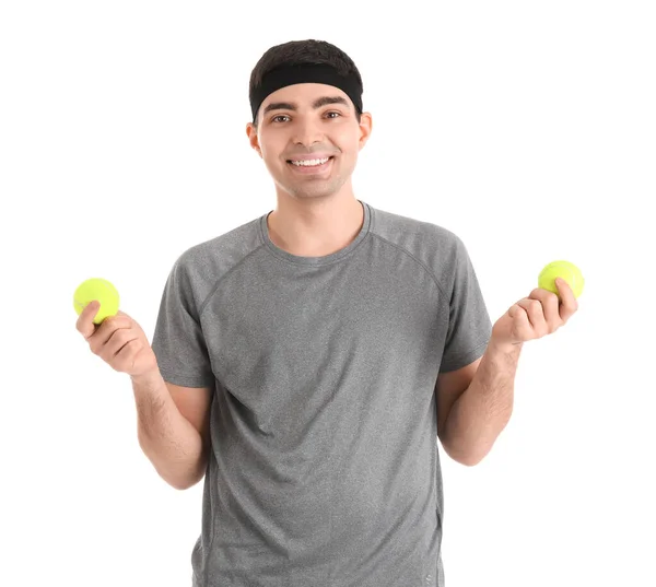 Sportlicher Junger Mann Mit Tennisbällen Auf Weißem Hintergrund Gleichgewichtskonzept — Stockfoto