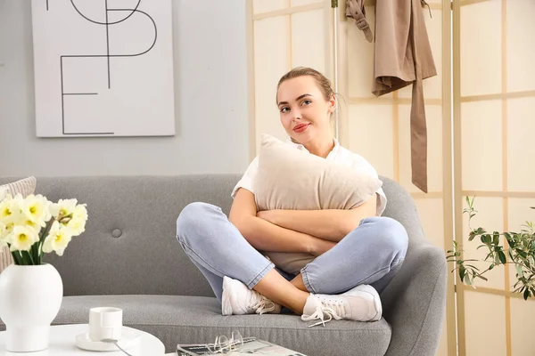 Thoughtful Young Woman Pillow Sitting Sofa Home — Stock Photo, Image