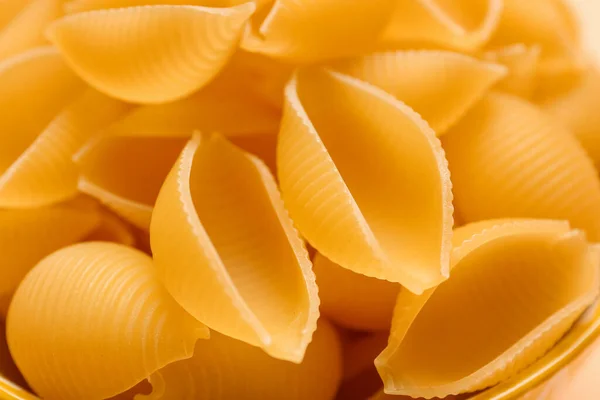 Ωμά Ζυμαρικά Conchiglie Φόντο Closeup — Φωτογραφία Αρχείου