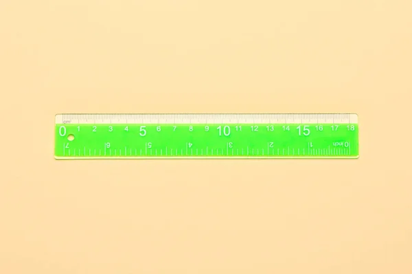 Green Plastic Ruler Beige Background — Stock Photo, Image