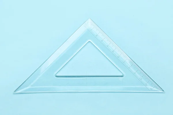 Regla Plástico Triángulo Transparente Sobre Fondo Azul —  Fotos de Stock