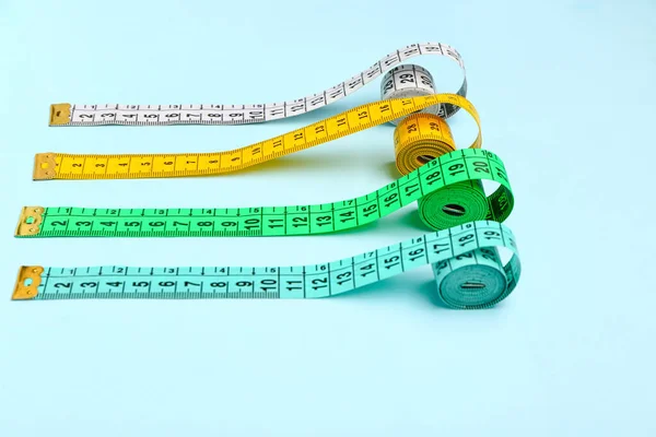 Colorful Measuring Tapes Blue Background — Stock Photo, Image