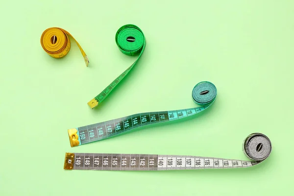 Colorful Measuring Tapes Green Background — Stock Photo, Image