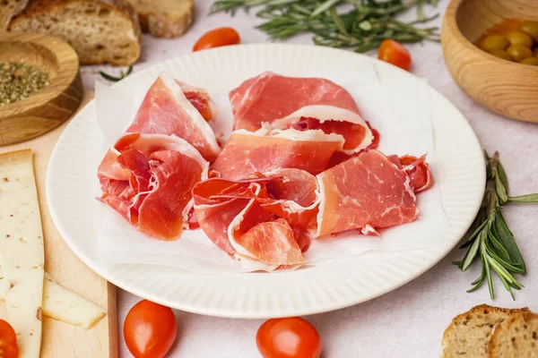 Plate Tasty Jamon Slices Light Background — Stock Photo, Image