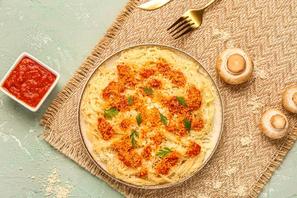 stock image Plate of tasty Italian pasta with Parmesan cheese and sauce on light background